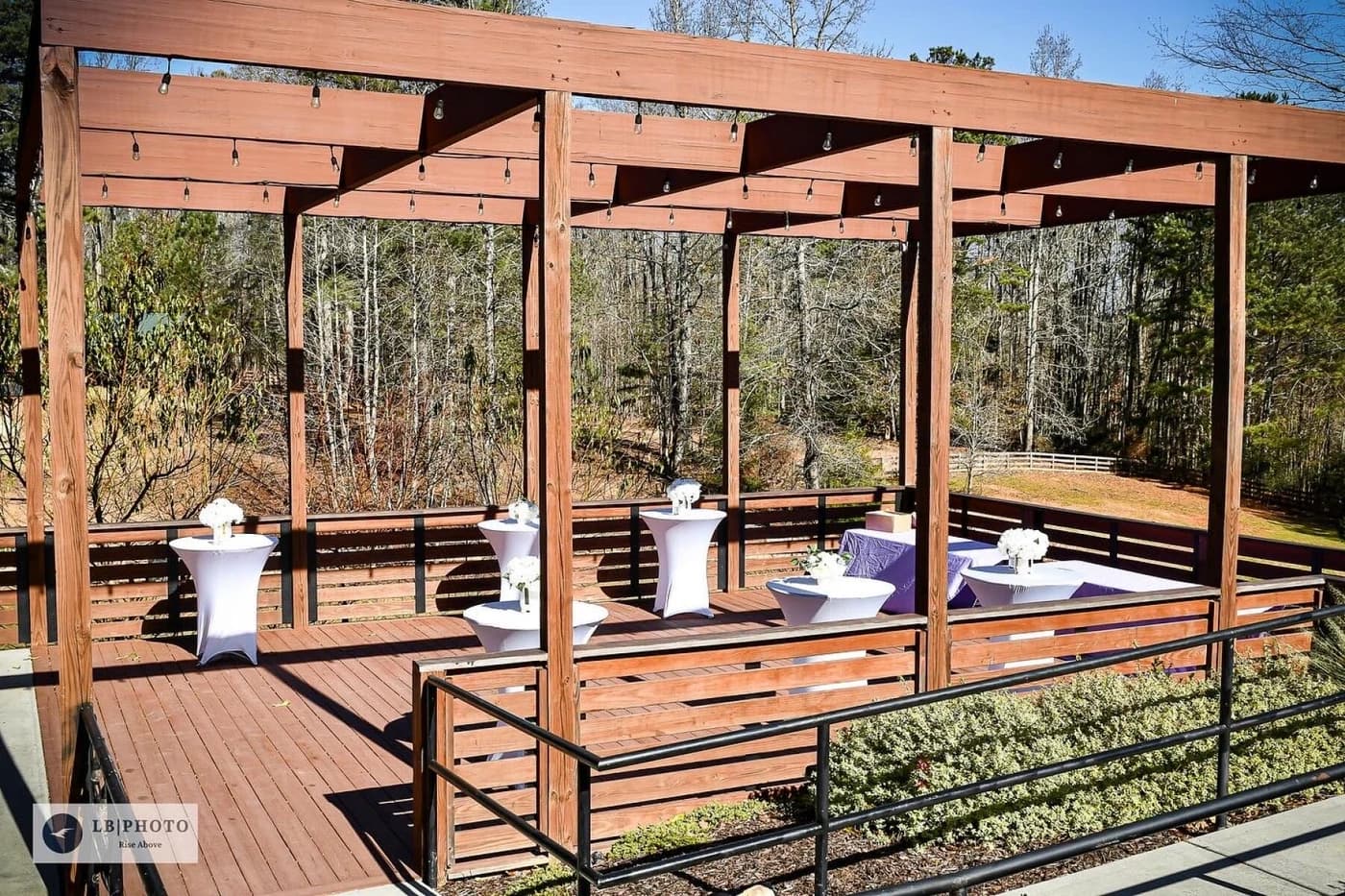Elegant wedding ceremony setup under a pergola